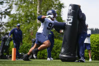 Seattle Seahawks defensive tackle Byron Murphy II runs a drill during the NFL football team's rookie minicamp Friday, May 3, 2024, in Renton, Wash. (AP Photo/Lindsey Wasson)