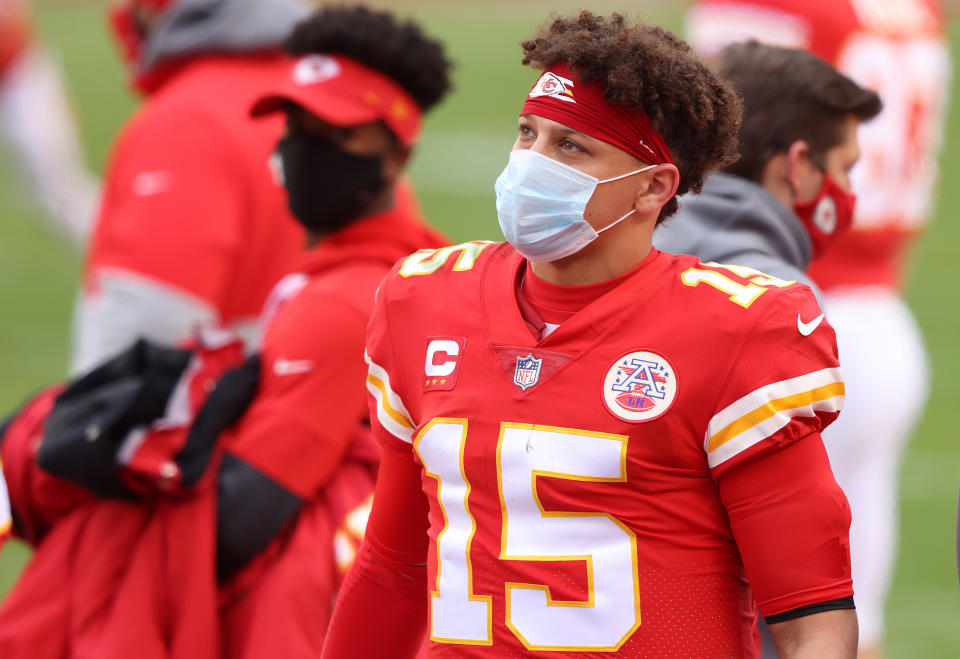 KANSAS CITY, MISSOURI - JANUARY 17: Quarterback Patrick Mahomes #15 of the Kansas City Chiefs looks on from the sidelines during the AFC Divisional Playoff game against the Cleveland Browns at Arrowhead Stadium on January 17, 2021 in Kansas City, Missouri. (Photo by Jamie Squire/Getty Images)