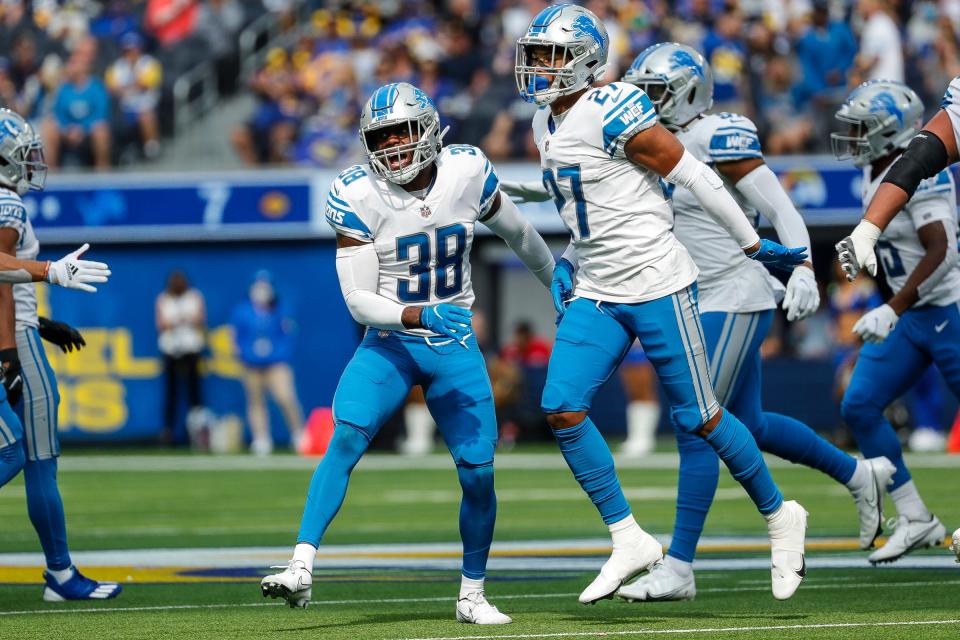 Detroit Lions defensive back C.J. Moore (38) and cornerback Bobby Price (27) celebrate a play against Los Angeles Rams during the first half at the SoFi Stadium in Inglewood, Calif. on Sunday, Oct. 24, 2021.