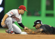 MIAMI, FL - APRIL 13: Jose Reyes #7 of the Miami Marlins steals second base against the Houston Astros at Marlins Park on April 13, 2012 in Miami, Florida. (Photo by Marc Serota/Getty Images)