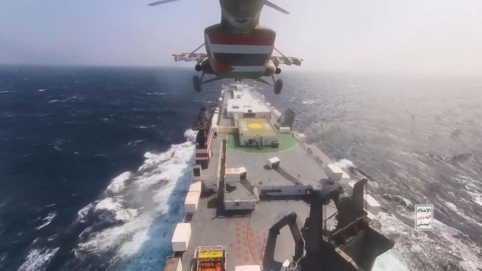 This handout screen grab captured from a video shows Yemen's Houthi fighters' takeover of the Galaxy Leader Cargo in the Red Sea coast off Hudaydah, on November 20, 2023 in the Red Sea, Yemen. - Houthi Movement/Handout/Getty Images