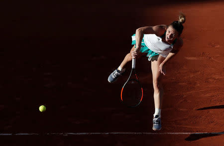Romania's Simona Halep in action during her first round match against Slovakia's Jana Cepelova. REUTERS/Benoit Tessier