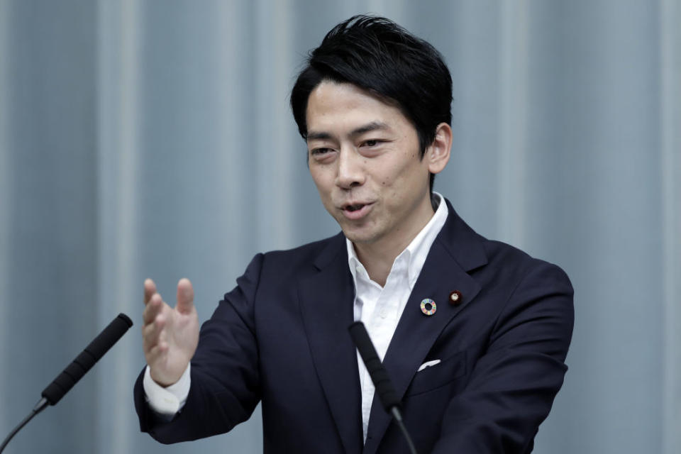 Shinjiro Koizumi, Japan's newly-appointed environment minister, gestures while speaking during a news conference at the Prime Minister's official residence in Tokyo, Japan, on Wednesday, Sept. 11, 2019. Japanese Prime Minister Shinzo Abe reshuffled his cabinet Wednesday, appointing allies to key positions as he moves closer to becoming the country's longest-serving premier in November. Photographer: Kiyoshi Ota/Bloomberg