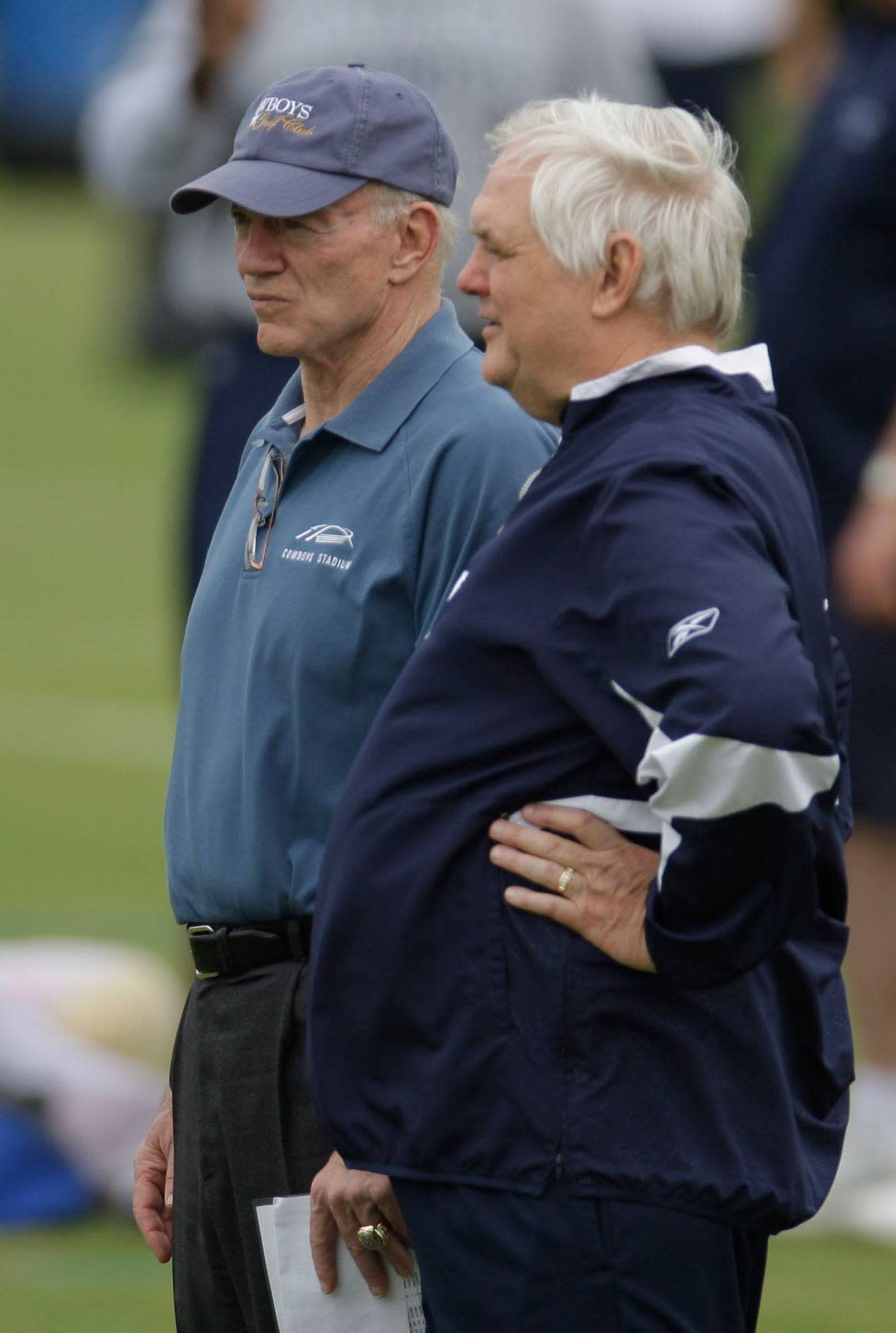 2010: Dallas Cowboys owner Jerry Jones, left, and head coach Wade Phillips watch workout during a team rookie football mini-camp at Valley Ranch.