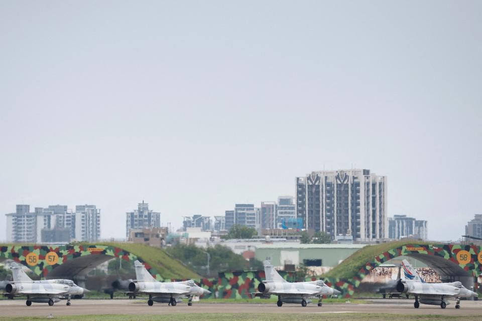 Taiwan Air Force Mirage 2000-5 aircraft prepare to take off at Hsinchu Air Base, in Hsinchu (Reuters)