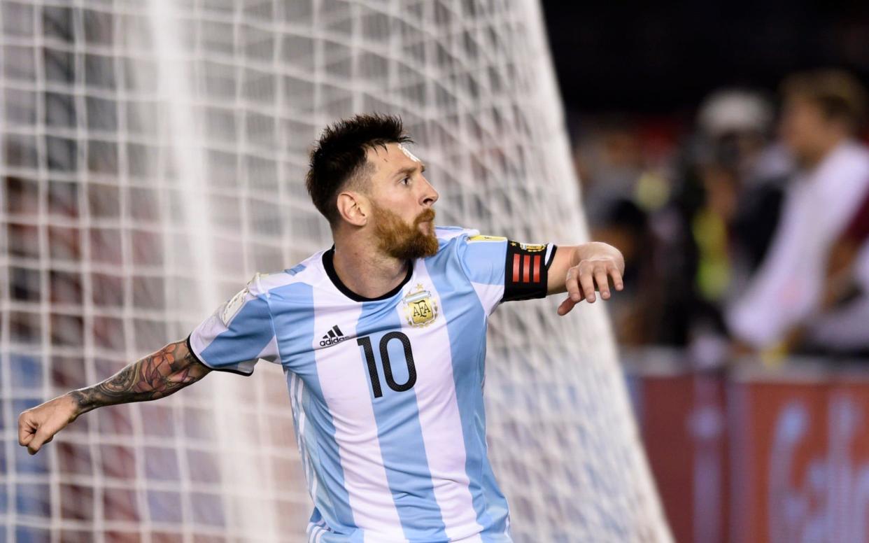 Argentina’s Lionel Messi celebrates after scoring a penalty against Chile  - AP