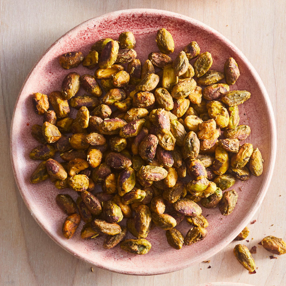 <p>Nutritional yeast mimics the flavor of cheese, lending a pizza-like flavor to these playful spiced pistachios. <a href="https://www.eatingwell.com/recipe/7881711/pizza-pistachios/" rel="nofollow noopener" target="_blank" data-ylk="slk:View Recipe;elm:context_link;itc:0;sec:content-canvas" class="link ">View Recipe</a></p>