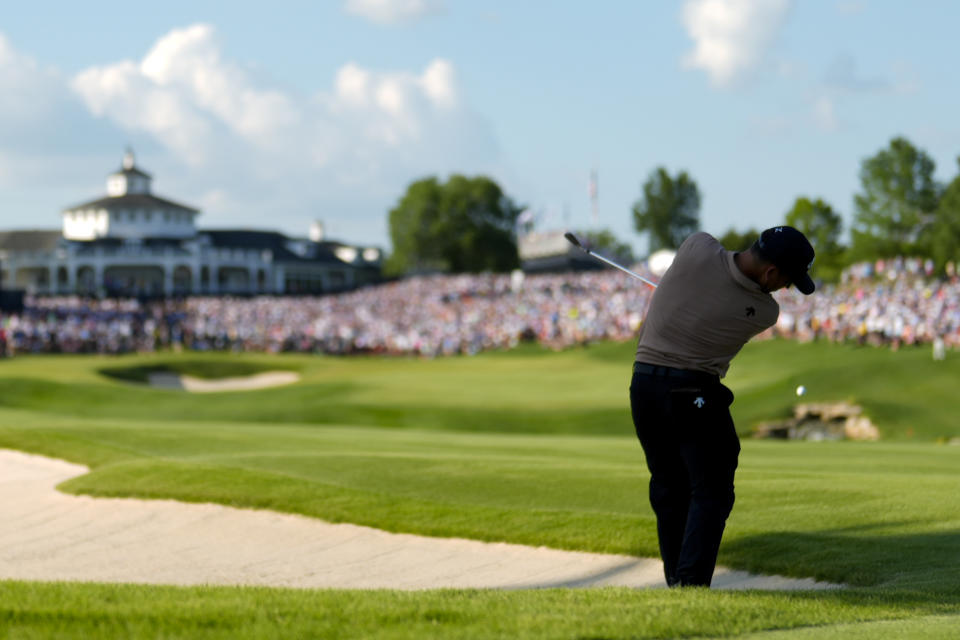 Xander Schauffele hits from the rough on the 18th hole during the final round of the PGA Championship golf tournament at the Valhalla Golf Club, Sunday, May 19, 2024, in Louisville, Ky. (AP Photo/Matt York)