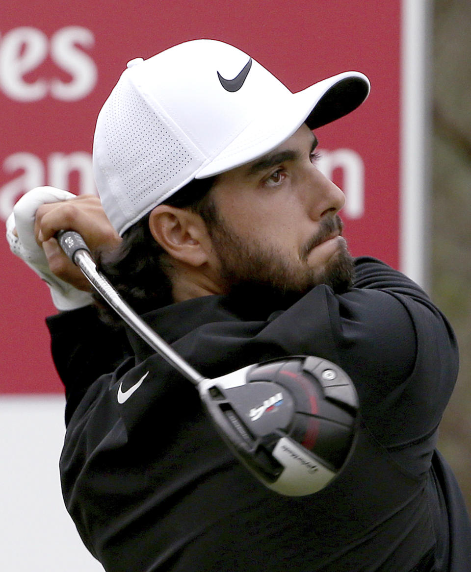 Abraham Ancer of Mexico tees off on the 8th during the Australian Open Golf tournament in Sydney, Thursday, Nov. 15, 2018. (AP Photo/Rick Rycroft)