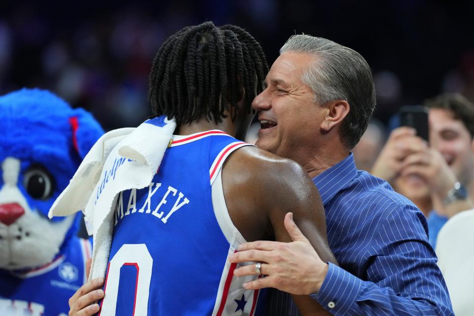 Tyrese Maxey hugs Kentucky coach John Calipari after Game 2 of the Eastern Conference first-round playoffs against Brooklyn.