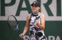 United States's Sofia Kenin celebrates after defeating United States's Hailey Baptiste during their second round match on day 5, of the French Open tennis tournament at Roland Garros in Paris, France, Thursday, June 3, 2021. (AP Photo/Christophe Ena)