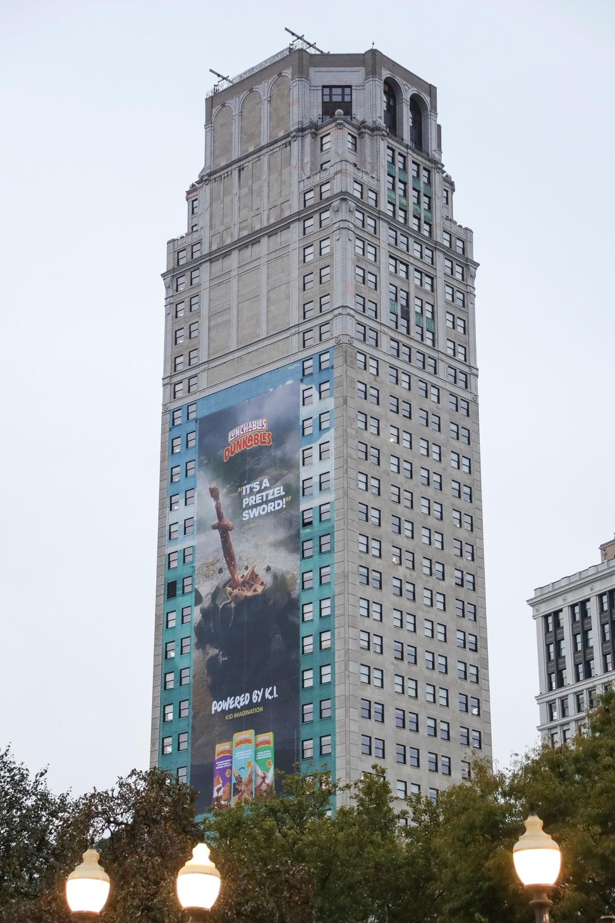 An advertisement for Lunchables covers the 1997 Robert Wyland whale on the side of the Broderick Tower in downtown Detroit on Tuesday, Oct. 10, 2023.