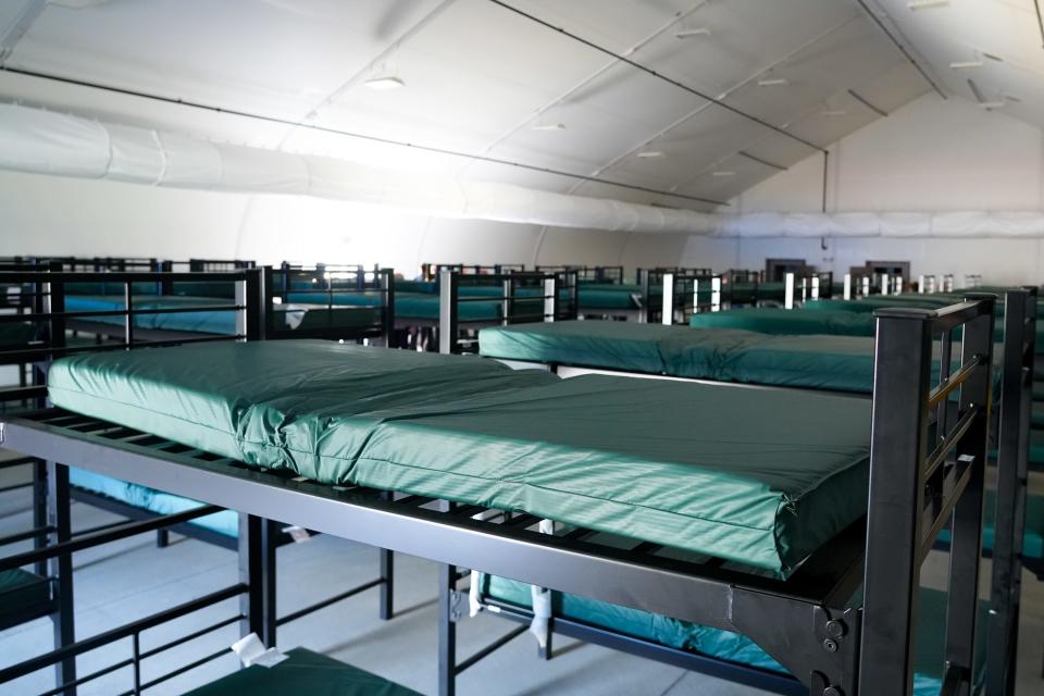 Human Services Camp Inc. opens a 6,300-square-foot, 100-bed overnight shelter on the corner of Ninth Avenue and Jackson Street in Phoenix on March 25, 2022.