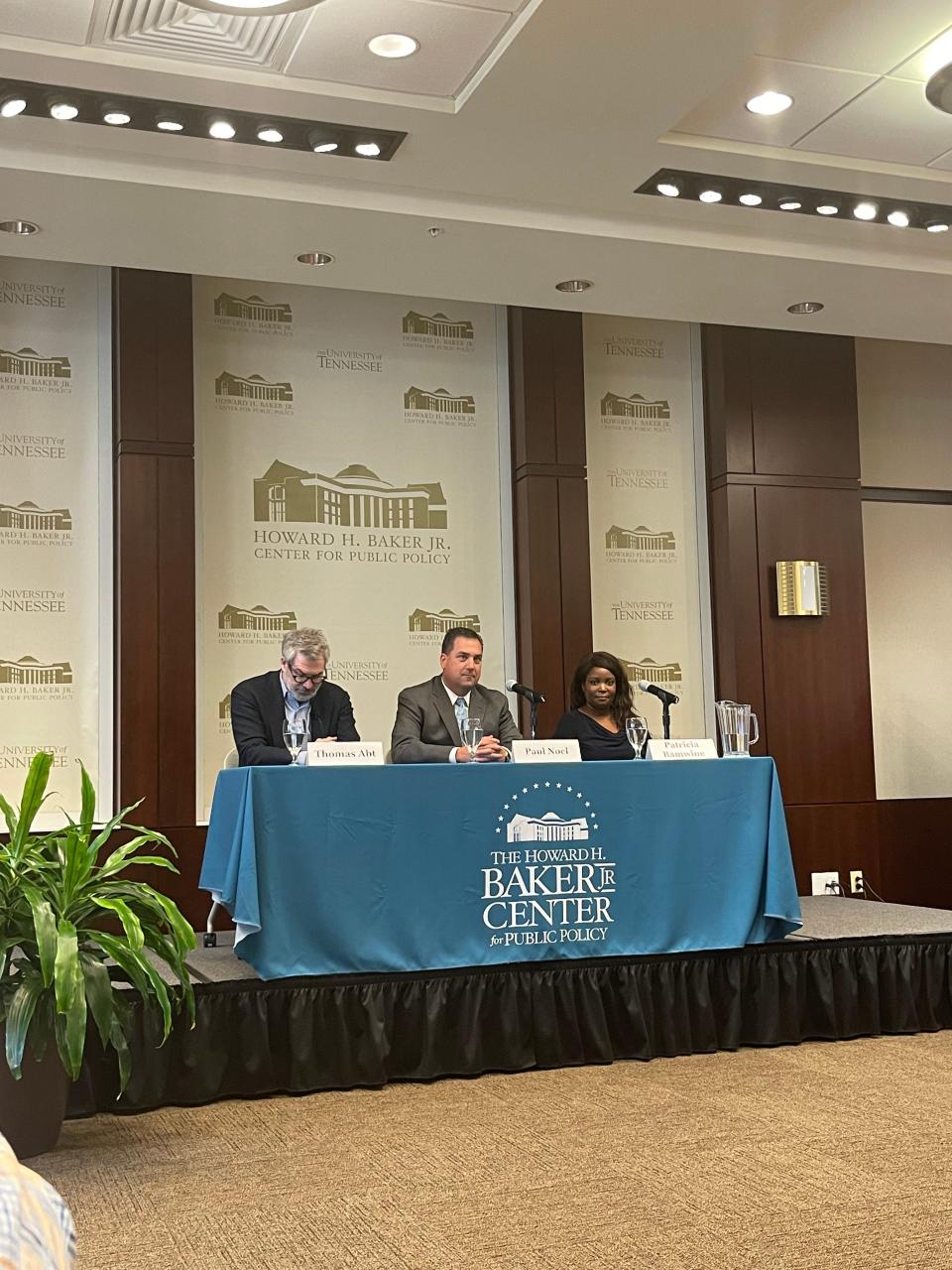 Thomas Abt, Paul Noel, and Dr. Patricia Bamwine speak to leaders and community members during a panel at University of Tennessee's Howard Baker Jr. Center for Public Policy on May 4,  2022.