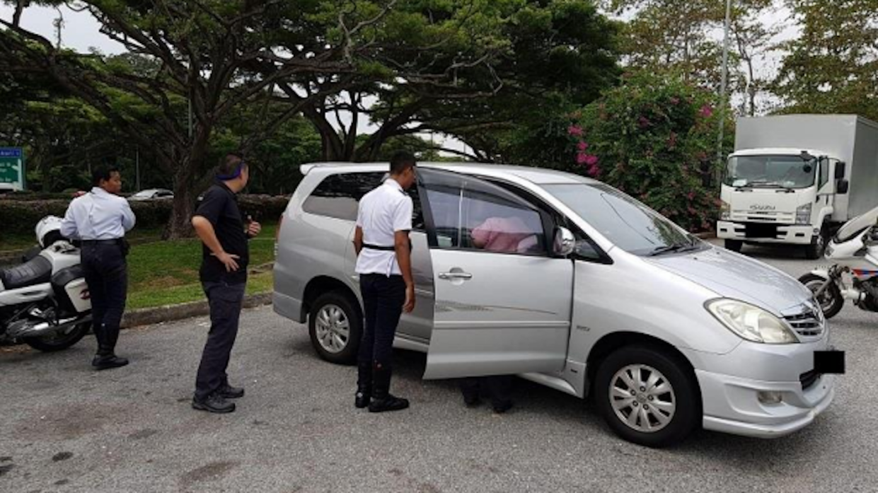 LTA officers conducting enforcement operations along East Coast Park Service Road. (PHOTO: Land Transport Authority)