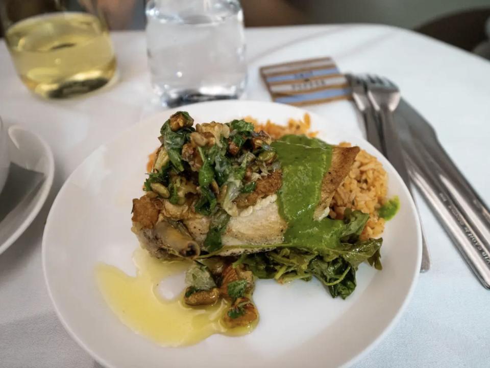 One of the meals served onboard the test flight: chicken breast with Spanish rice, kale, tomatillo sauce, and pepita salsa.