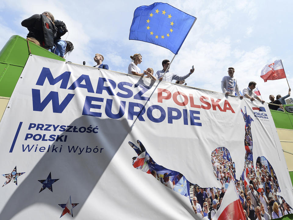 Thousands of Poles with pro-European banners march to celebrate Poland's 15 years in the EU and stressing the nation's attachment to the 28-member bloc ahead of May 26 key elections to the European Parliament, in Warsaw, Poland, Saturday, May 18, 2019.(AP Photo/Czarek Sokolowski)