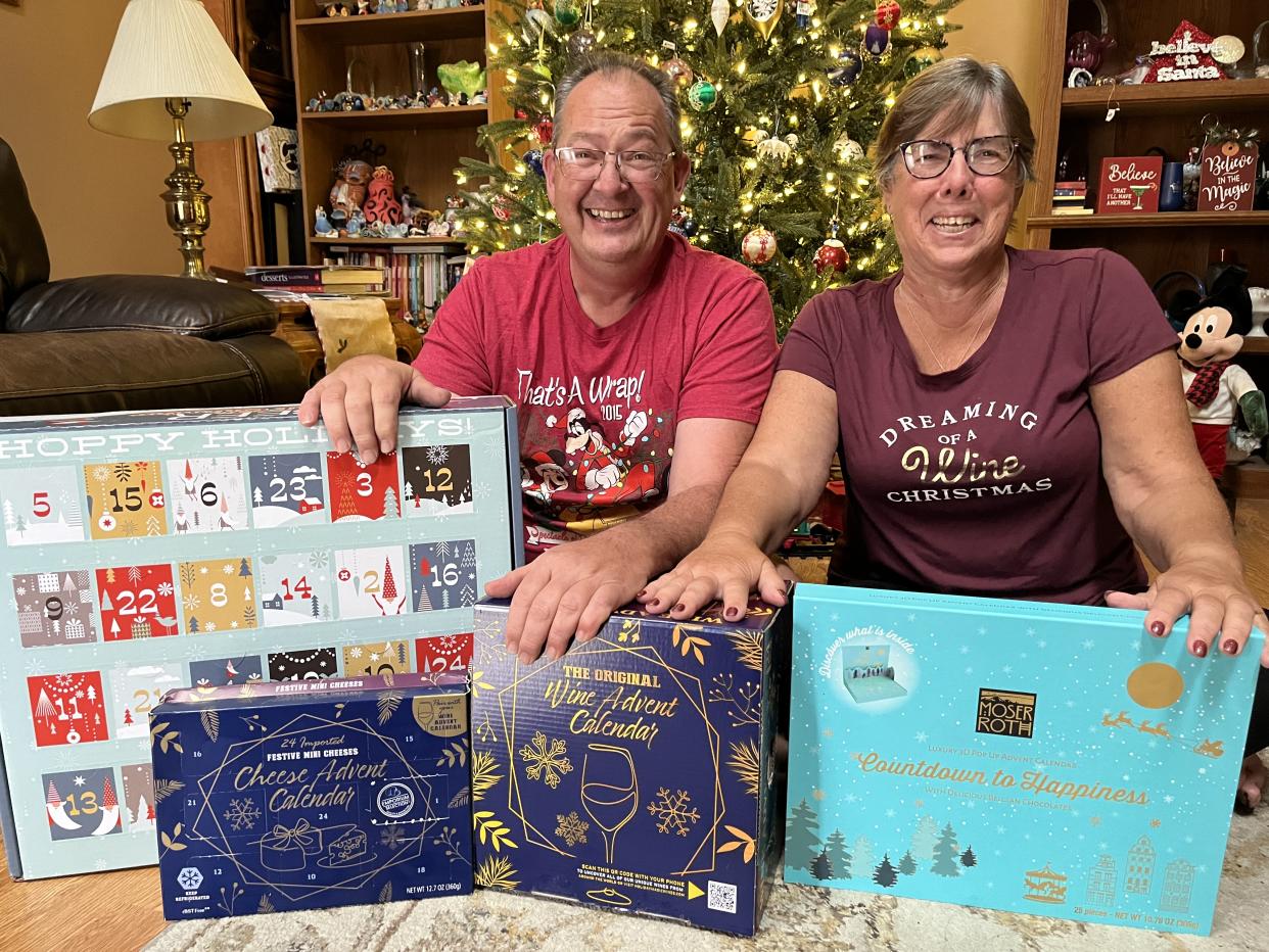 My mom and dad with this year's selection of Advent calendars. (Photo: Megan duBois)