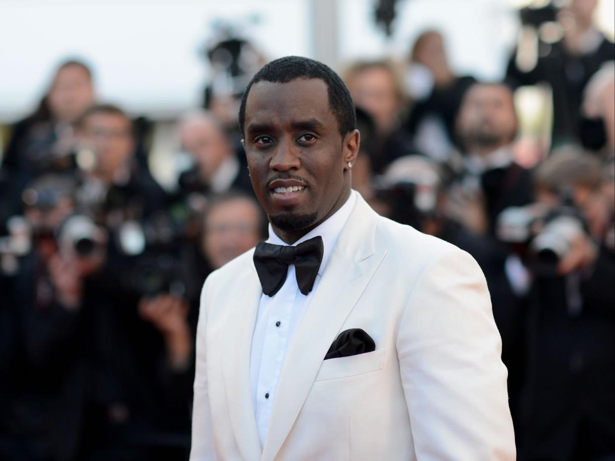 Diddy says he wasn’t trolling Lopez with throwback photo (Getty Images)