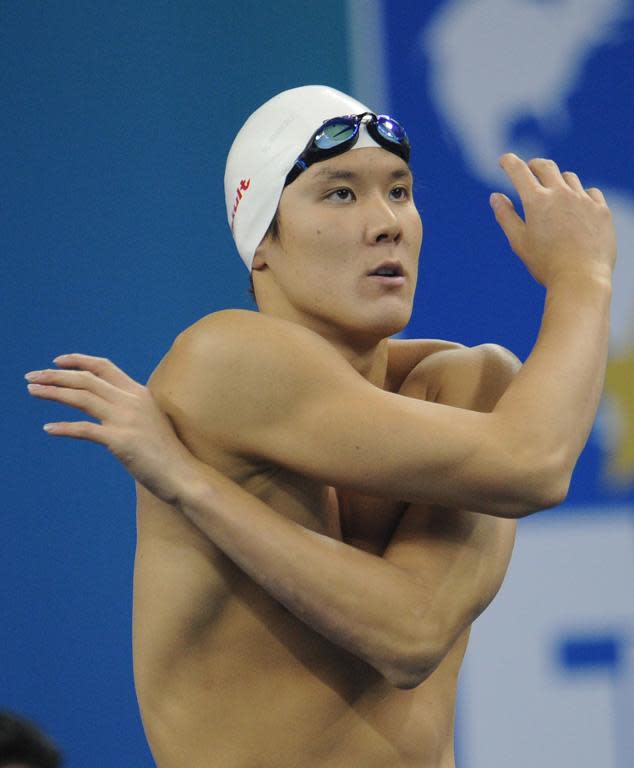 South Korea's Park Tae Hwan warms up prior to a swimming event at the FINA World Championships in Shanghai, in 2011