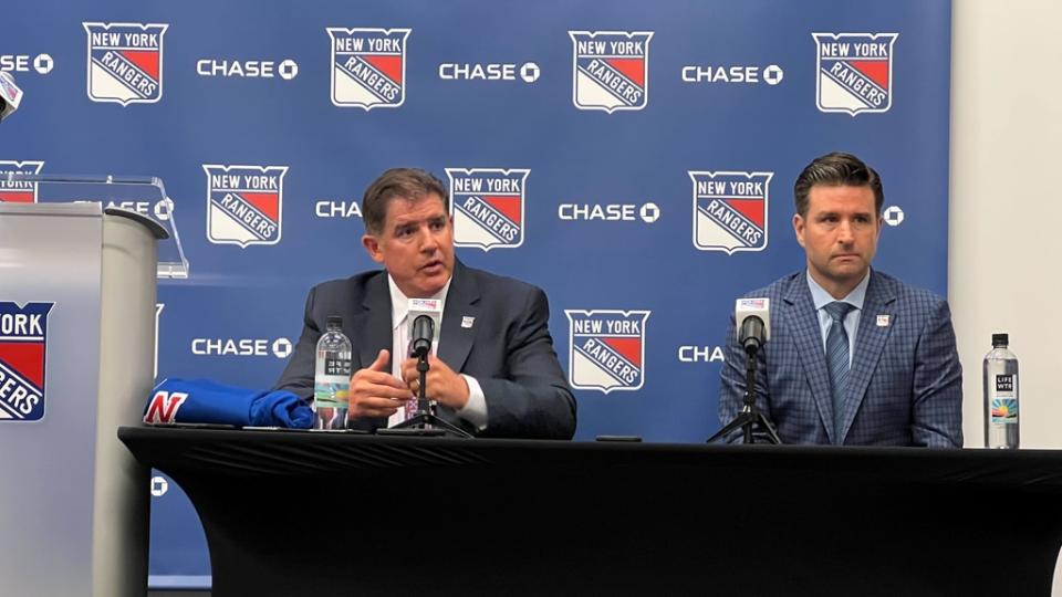 Peter Laviolette speaks to the media alongside Chris Drury at his introductory press conference as the head coach of the New York Rangers.