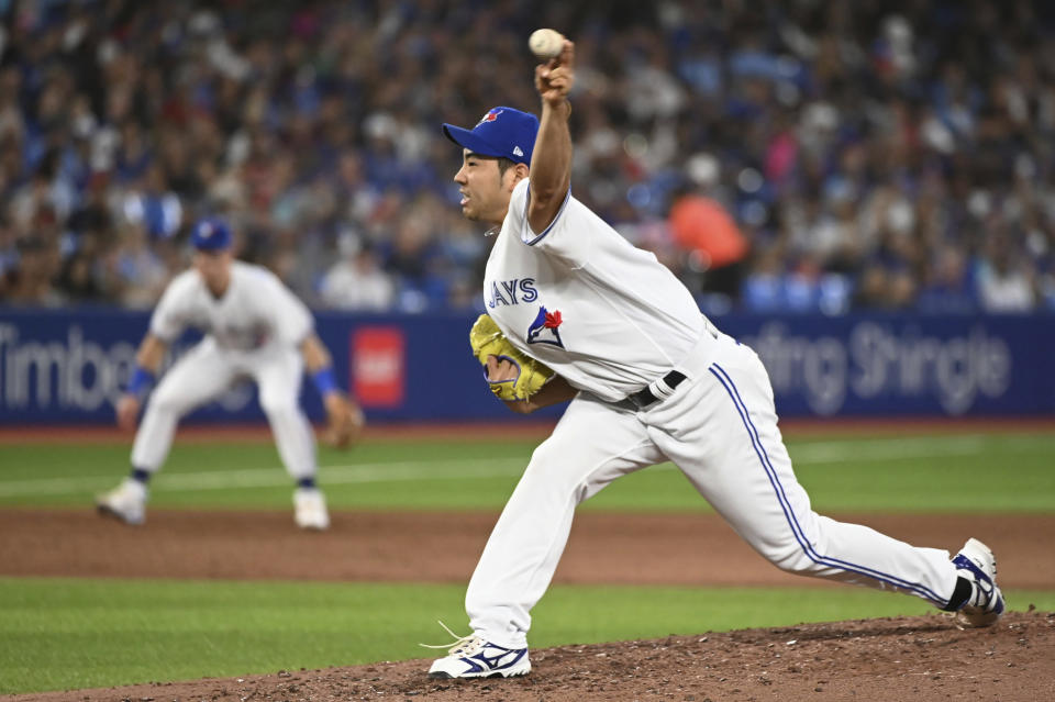 Toronto Blue Jays relief pitcher Yusei Kikuchi throws to a Los Angeles Angels batter during sixth-inning baseball game action in Toronto, Friday, Aug. 26, 2022. (Jon Blacker/The Canadian Press via AP)