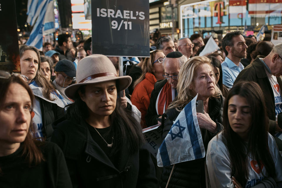 Pro-Israel supporters gather to demand the immediate release of all hostages held by Hamas during a demonstration at Times Square on Thursday, Oct. 19, 2023, in New York. (AP Photo/Andres Kudacki)