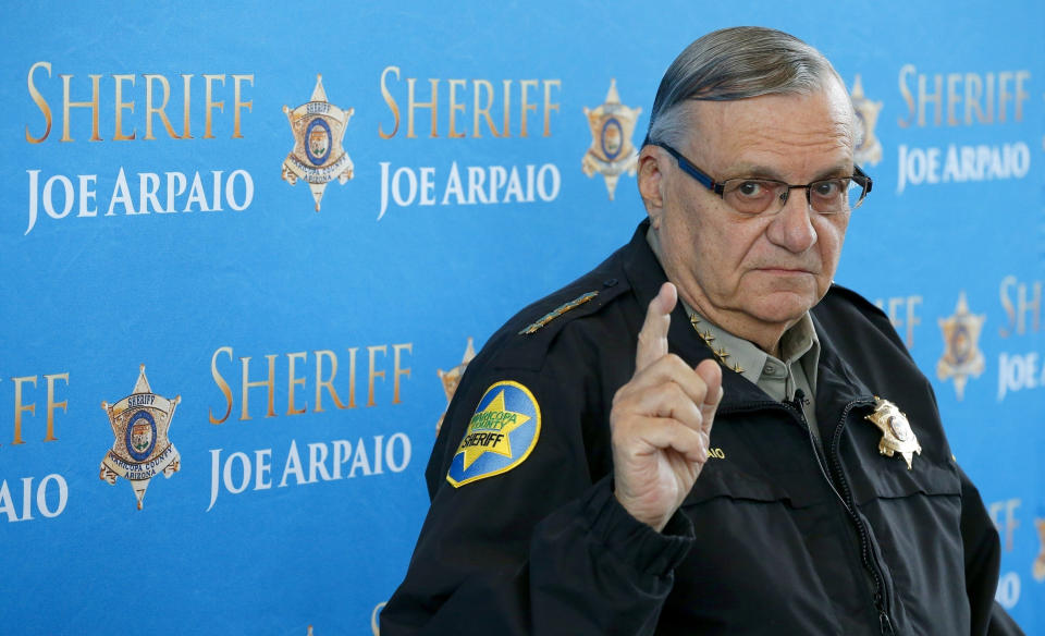 FILE - In this Dec. 18, 2013, file photo, former Maricopa County Sheriff Joe Arpaio pauses as he answers a question during a news conference at Maricopa County Sheriff's Office Headquarters in Phoenix. Arpaio's primary defeat in his bid to win back the sheriff's post in metro Phoenix marks what's likely to be the 88-year-old's last political campaign. (AP Photo/Ross D. Franklin, File)