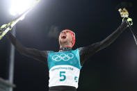 <p>Johannes Rydzek of Germany celebrates winning the gold medal during the Nordic Combined Individual Gundersen 10km Cross-Country on day eleven of the PyeongChang 2018 Winter Olympic Games at Alpensia Cross-Country Skiing Centre on February 20, 2018 in Pyeongchang-gun, South Korea. (Photo by Lars Baron/Getty Images) </p>