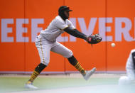 Pittsburgh Pirates right fielder Gregory Polanco loses the ball on a Detroit Tigers' Victor Reyes line drive for a double in the third inning during the first game of a doubleheader baseball game in Detroit, Wednesday, April 21, 2021. (AP Photo/Paul Sancya)