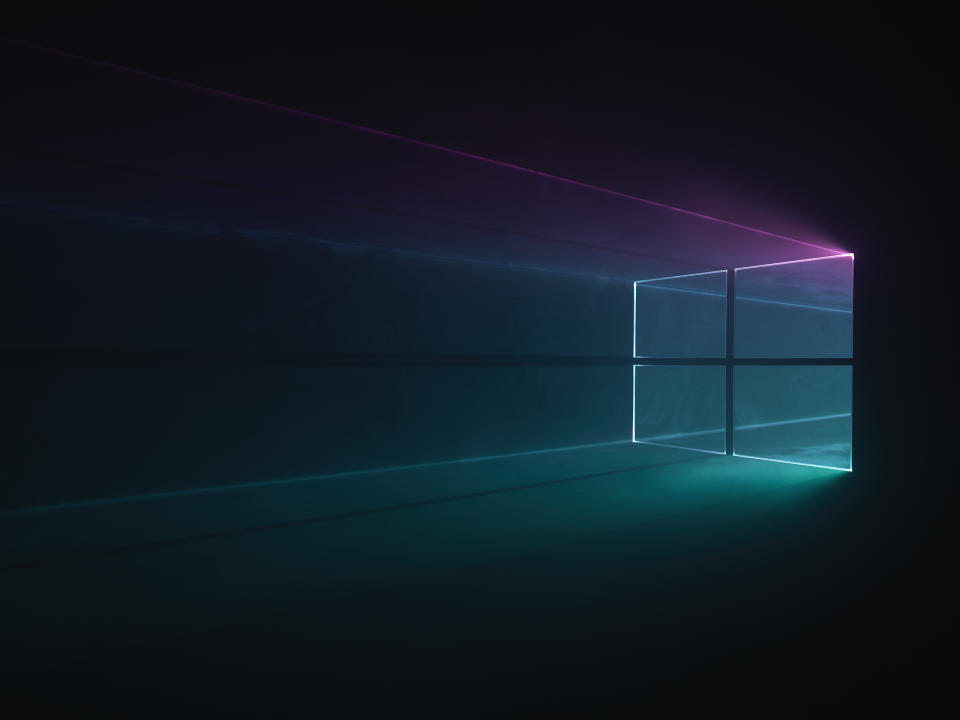 WIP versions of Windows 10 desktop background with light being filtered through a physical windows 10 logo