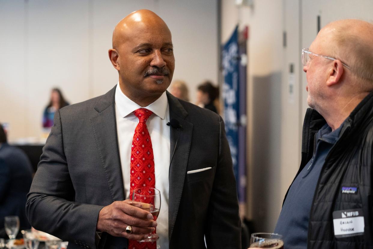 Curtis Hill, the former Indiana attorney general, talks with an attendee before the start of the National Federation of Independent Businesses gubernatorial candidate forum and luncheon on Tuesday, March 19, 2024, at the Wellington Fishers Banquet & Conference Center in Fishers, Indiana.