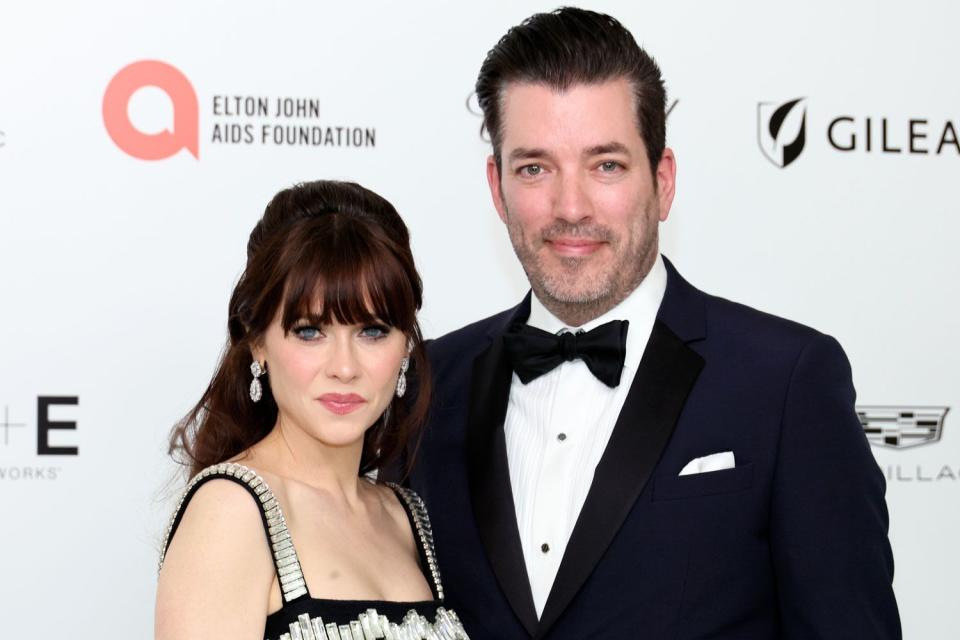 <p>Dia Dipasupil/WireImage</p> Jonathan Scott and Zooey Deschanel in March 2024 