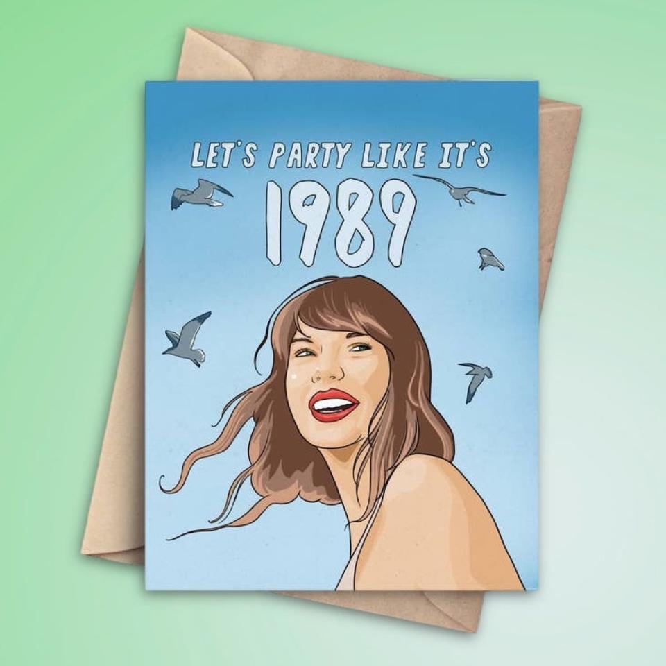 <p><a href="https://go.redirectingat.com?id=74968X1596630&url=https%3A%2F%2Ffriendsnyc.com%2Fproducts%2Ftaylor-swift-1989-new-year-holiday-cards-christmas-cards-2023&sref=https%3A%2F%2Fwww.biography.com%2Fbio-buys%2Fg46120023%2Fbest-taylor-swift-gifts%2F" rel="nofollow noopener" target="_blank" data-ylk="slk:Shop Now;elm:context_link;itc:0;sec:content-canvas" class="link ">Shop Now</a></p><p>Taylor Swift 1989 Greeting Card</p><p>friendsnyc.com</p><p>$5.99</p>