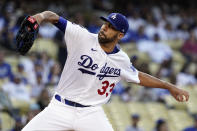 Los Angeles Dodgers starting pitcher David Price throws to the Los Angeles Angels during the first inning of a baseball game Friday, Aug. 6, 2021, in Los Angeles. (AP Photo/Marcio Jose Sanchez)