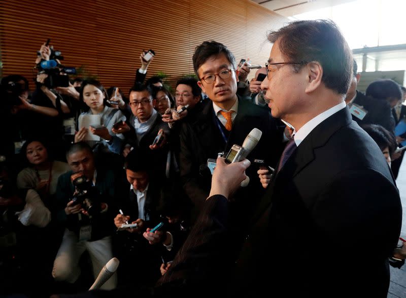 FILE PHOTO: South Korea's National Intelligence Service chief Suh Hoon talks to reporters after meeting with Japan's Prime Minister Shinzo Abe in Tokyo