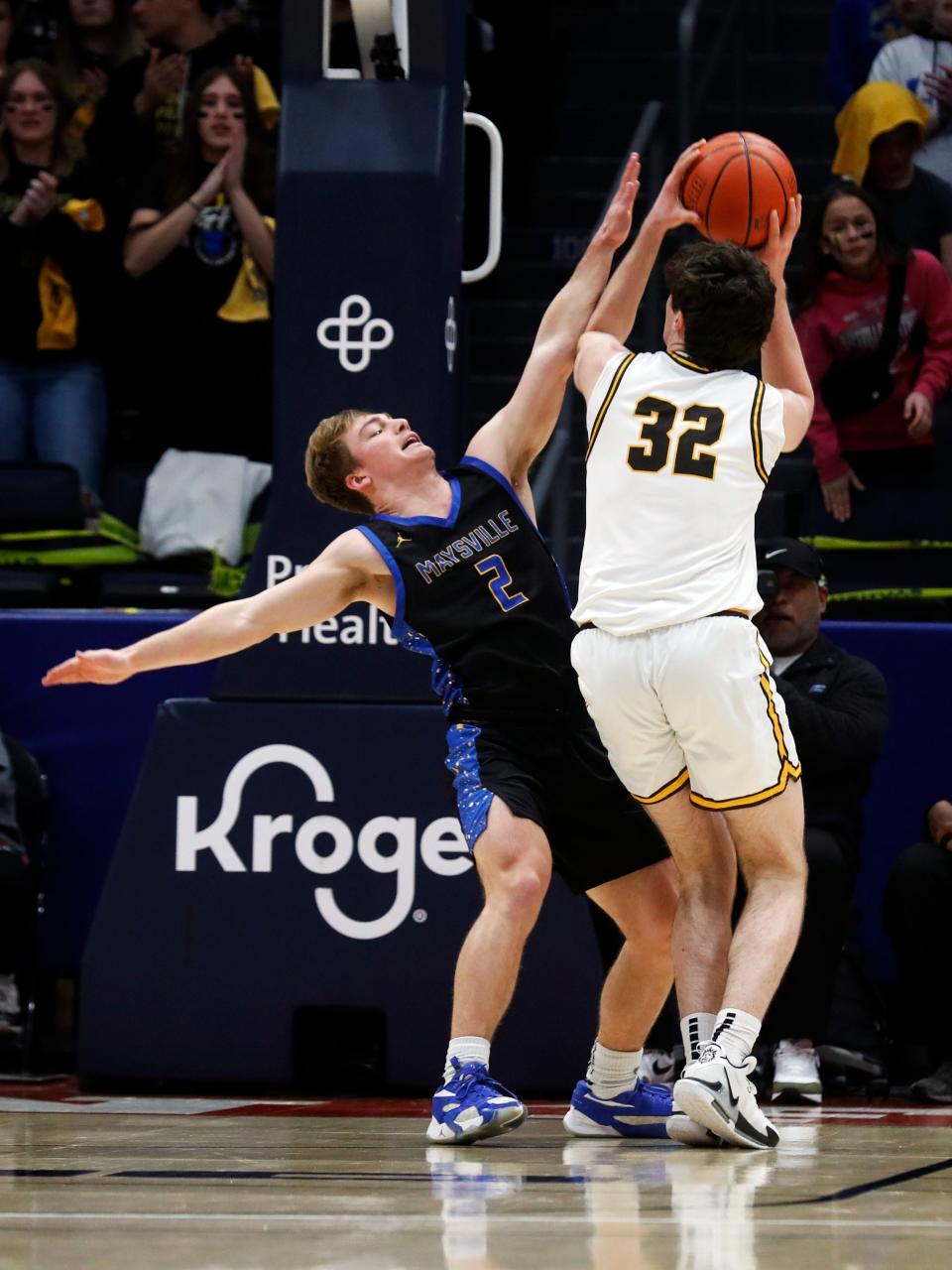 Wesley Armstead defends Charlie Uhl during Maysville's 68-54 loss to Kettering Alter during the Division II state finals on Sunday at University of Dayton Arena.