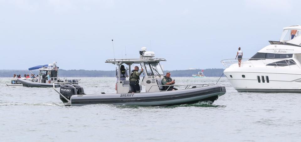 Two Okaloosa County Sheriff's Office Marine Unit boats patrol Crab Island on Wednesday. Law enforcement agencies say they a prepared for a busy Fourth of July weekend.