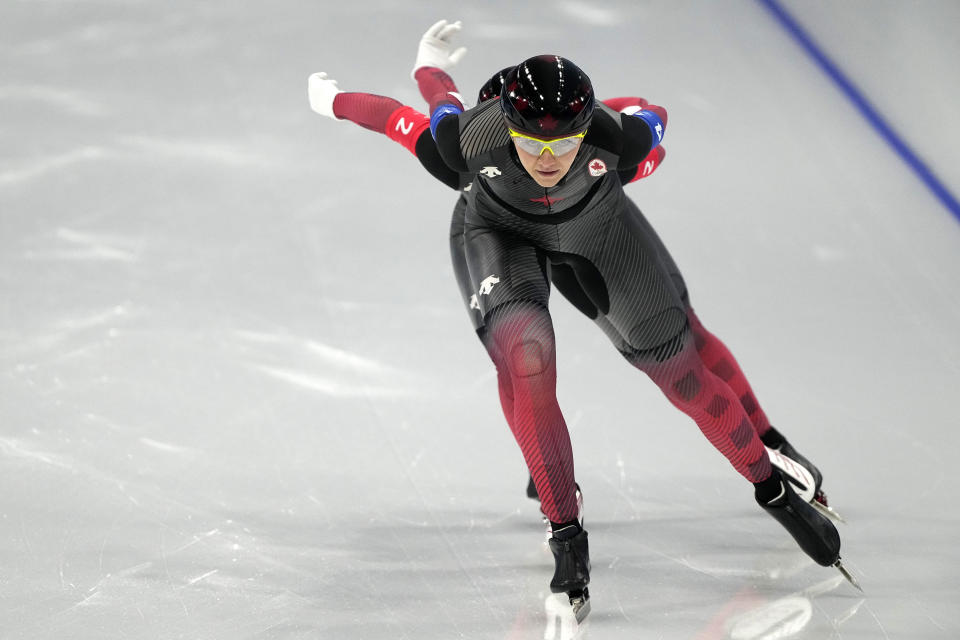 Team Canada, led by Isabelle Weidemann, with Valerie Maltais, competes during the speedskating women's team pursuit semifinals at the 2022 Winter Olympics, Tuesday, Feb. 15, 2022, in Beijing. (AP Photo/Ashley Landis)