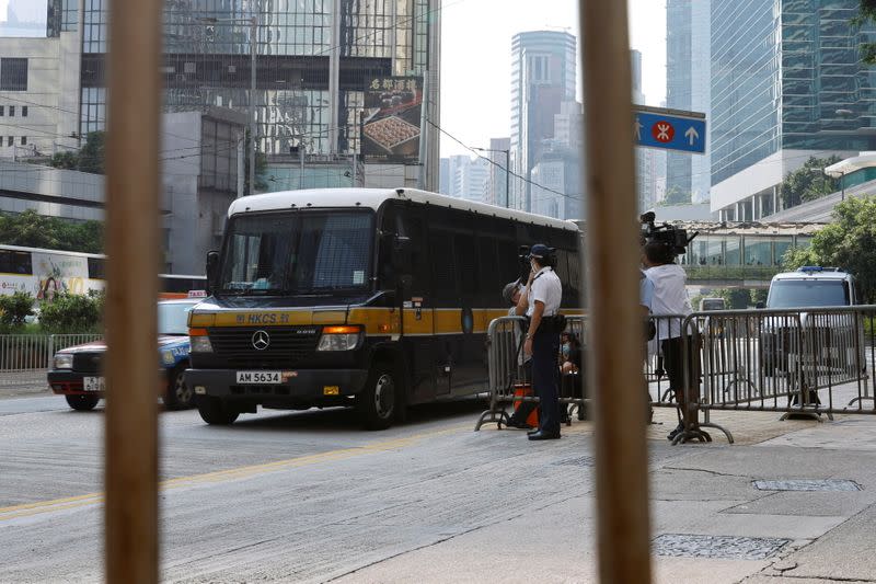 A prison van carrying Tong Ying-kit, the first person charged under the new national security law, arrives at High Court for a hearing, in Hong Kong