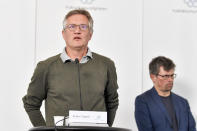 State epidemiologist Anders Tegnell, left, of the Public Health Agency of Sweden gives a daily update on the coronavirus COVID-19 situation, in Stockholm, Sweden, Wednesday June 3, 2020. Tagnell has shown some contrition as criticism has grown over the country’s approach of not locking down the country has resulted in one of the highest death rates per capita in the world. Tegnell told Swedish radio on Wednesday that “I think there is potential for improvement in what we have done in Sweden, quite clearly.” (Anders Wiklund / TT via AP)