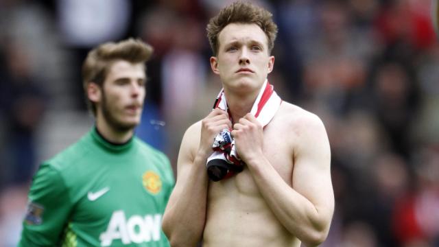 Phil Jones reacts after Manchester City pip Manchester United to the Premier League title in 2012. Credit: Alamy