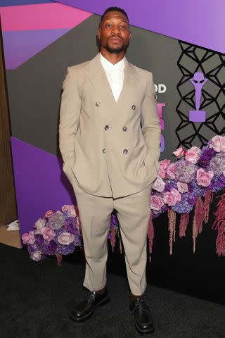 <p>Arnold Turner/Getty</p> Jonathan Majors at the Hollywood Unlocked Impact Awards