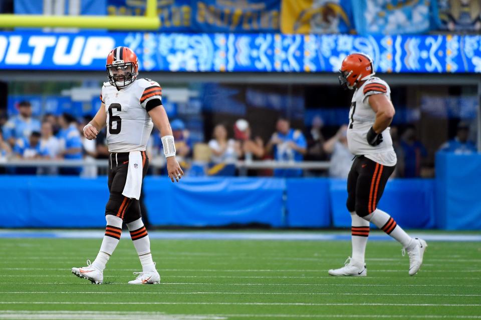 Browns quarterback Baker Mayfield walks off the field after a loss to the Chargers, Sunday, Oct. 10, 2021, in Inglewood, Calif. (AP Photo/Kevork Djansezian)