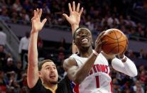 Jan 16, 2016; Auburn Hills, MI, USA; Detroit Pistons guard Reggie Jackson (1) drives to the basket against Golden State Warriors guard Klay Thompson (11) during the second quarter at The Palace of Auburn Hills. The Pistons won 113-95. Mandatory Credit: Raj Mehta-USA TODAY Sports