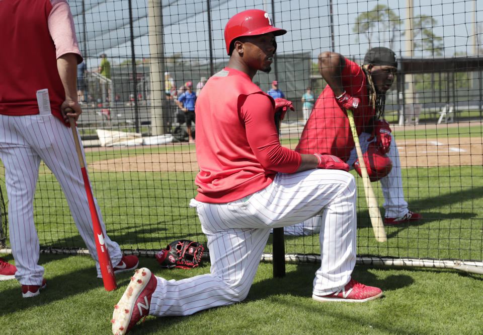 Philadelphia Phillies' Jean Segura watches batting practice at the Philadelphia Phillies spring training baseball facility, Tuesday, Feb. 19, 2019, in Clearwater, Fla. (AP Photo/Lynne Sladky)