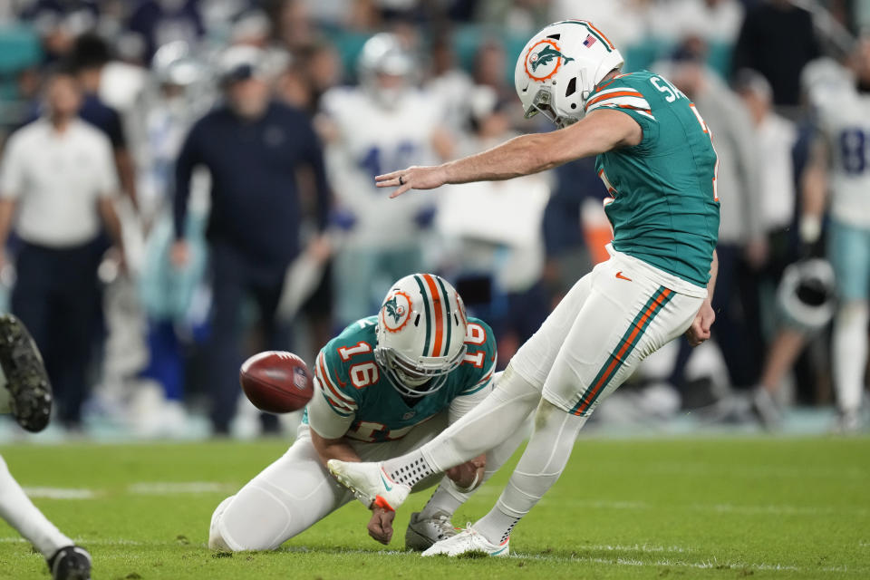 Miami Dolphins place kicker Jason Sanders kicks a field goal during the second half of an NFL football game against the Dallas Cowboys, Sunday, Dec. 24, 2023, in Miami Gardens, Fla. (AP Photo/Rebecca Blackwell)