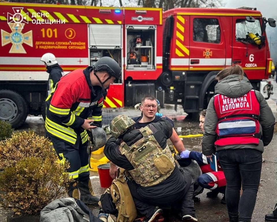 First responders injured as they conduct search and rescue operations after the Russian attacks in different locations around the country, killing and injuring civilians, destroying buildings and cars and causing fires in Odesa, Ukraine on March 15, 2024. According to Ukraine State Emergency Service, 20 people were injured, of which five were employees of the State Emergency Service. (State Emergency Service of Ukraine/Anadolu via Getty Images)