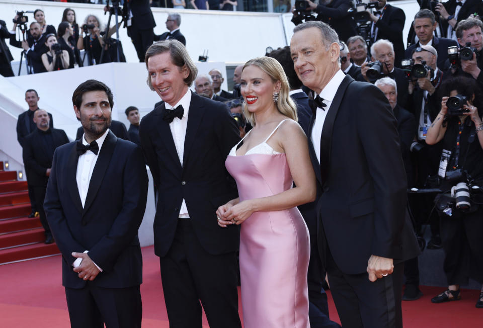 Jason Schwartzman, from left, director Wes Anderson, Scarlett Johansson, and Tom Hanks pose for photographers upon arrival at the premiere of the film 'Asteroid City' at the 76th international film festival, Cannes, southern France, Tuesday, May 23, 2023. (Photo by Joel C Ryan/Invision/AP)