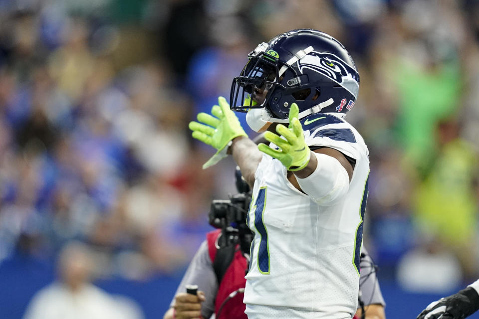 Seattle Seahawks tight end Gerald Everett (81) celebrates a touchdown against the Indianapolis Colts in the first half of an NFL football game in Indianapolis, Sunday, Sept. 12, 2021. (AP Photo/Charlie Neibergall)